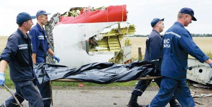 Ukraine rebels take control of crash victims remains