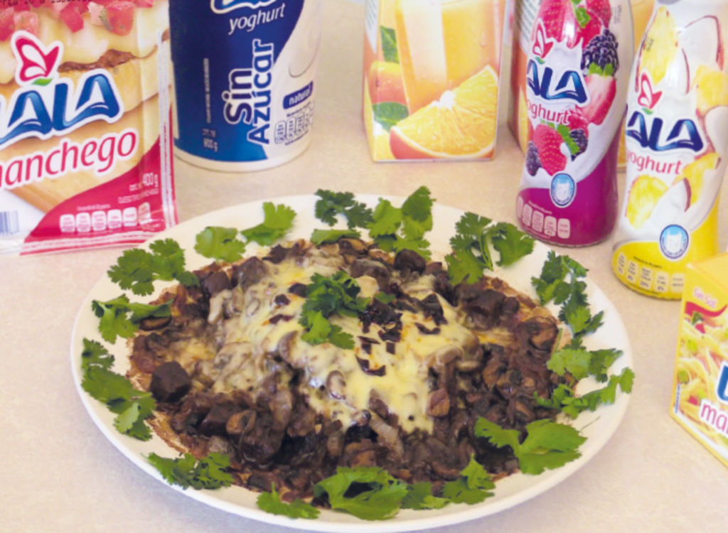 Bistec y champiñones gratinados