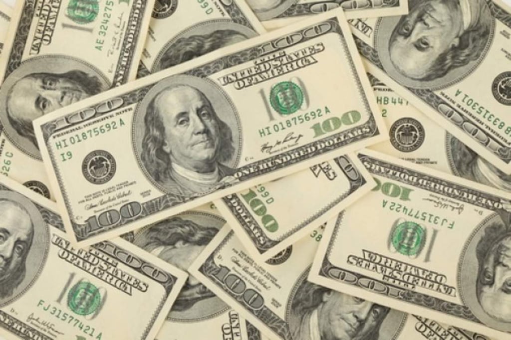 Dólar inicia el año en $21.05 en bancos