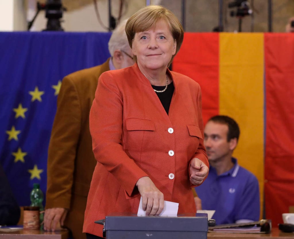 Merkel gana elección con 33.5%, según sondeo