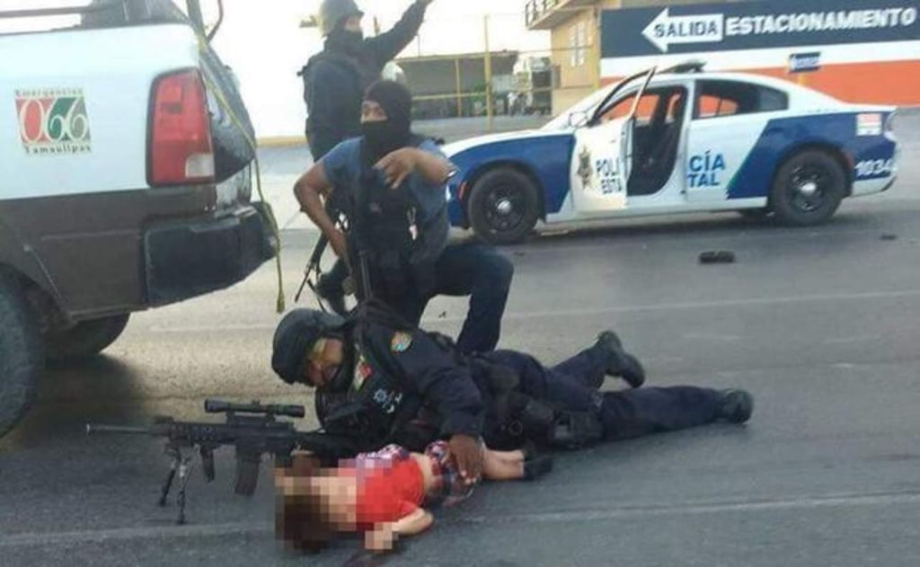 Policía protege a infante de balas en Tamaulipas