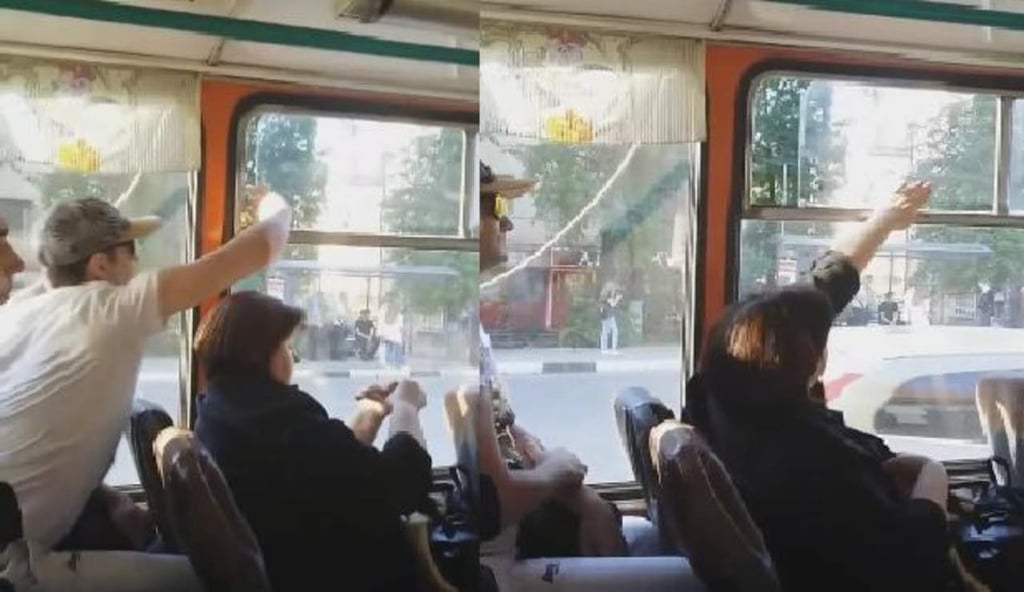 La viral batalla de dos pasajeros por la ventanilla de un camión