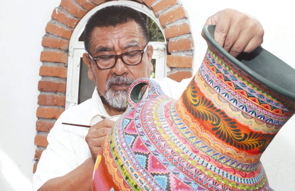 Élfego y el barro colorido