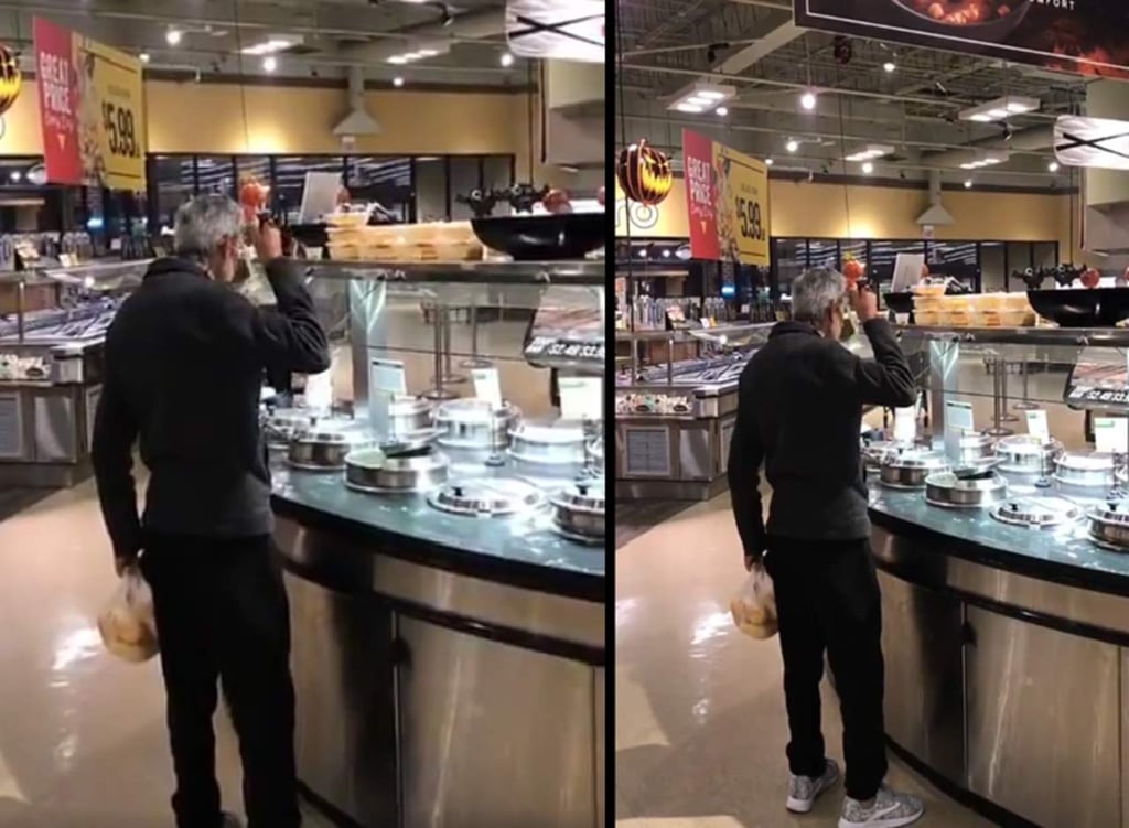 Hombre comiendo sopa directamente de la barra de servicio