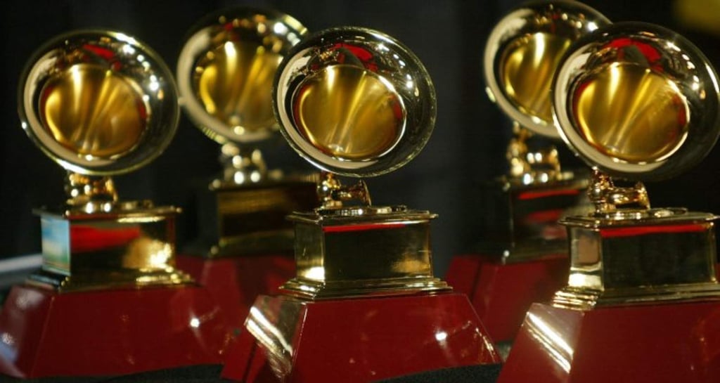 Grammy aplazan nominaciones por funeral de George H.W. Bush