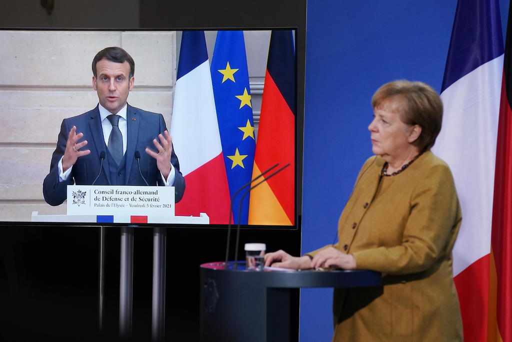 Macron y Merkel urgen a subir producción europea de vacunas contra COVID-19
