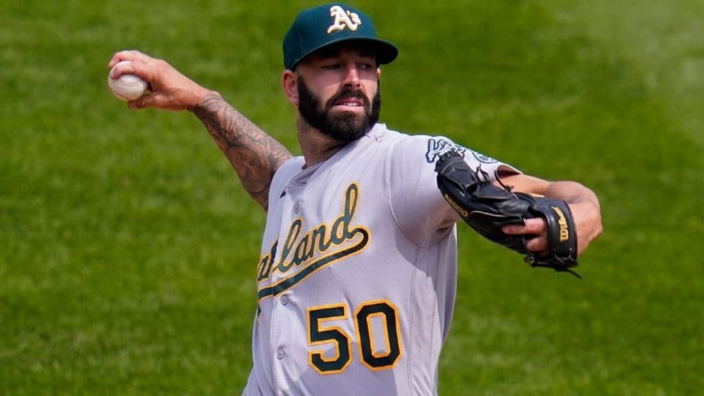 Mike Fiers sigue con Athletics