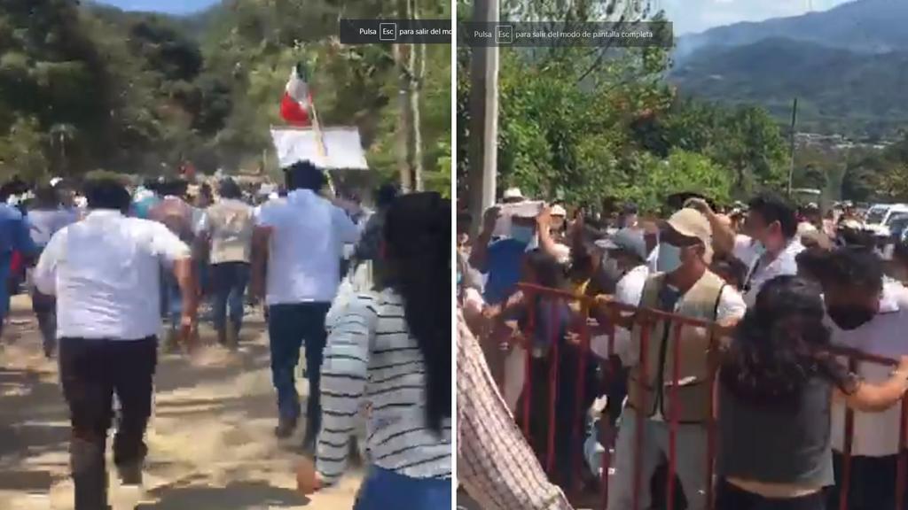 Pobladores rompen filtro de seguridad de evento de AMLO en Oaxaca