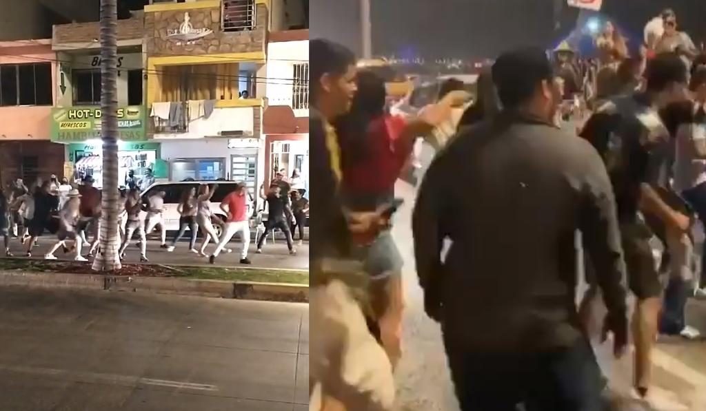 Decenas de personas bailan 'Payaso de Rodeo' en malecón de Mazatlán