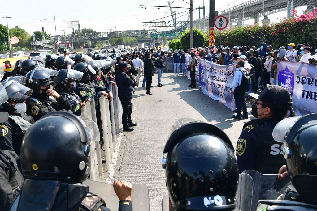 Protestan expolicías federales en CDMX