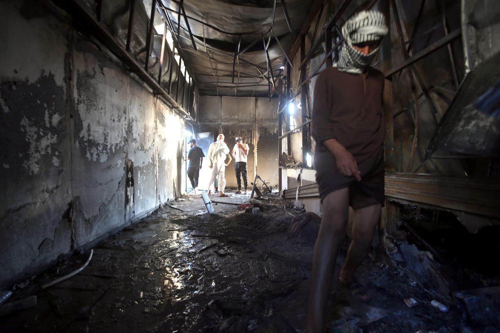 Suman 92 muertos por el incendio de un hospital para COVID-19 en Irak