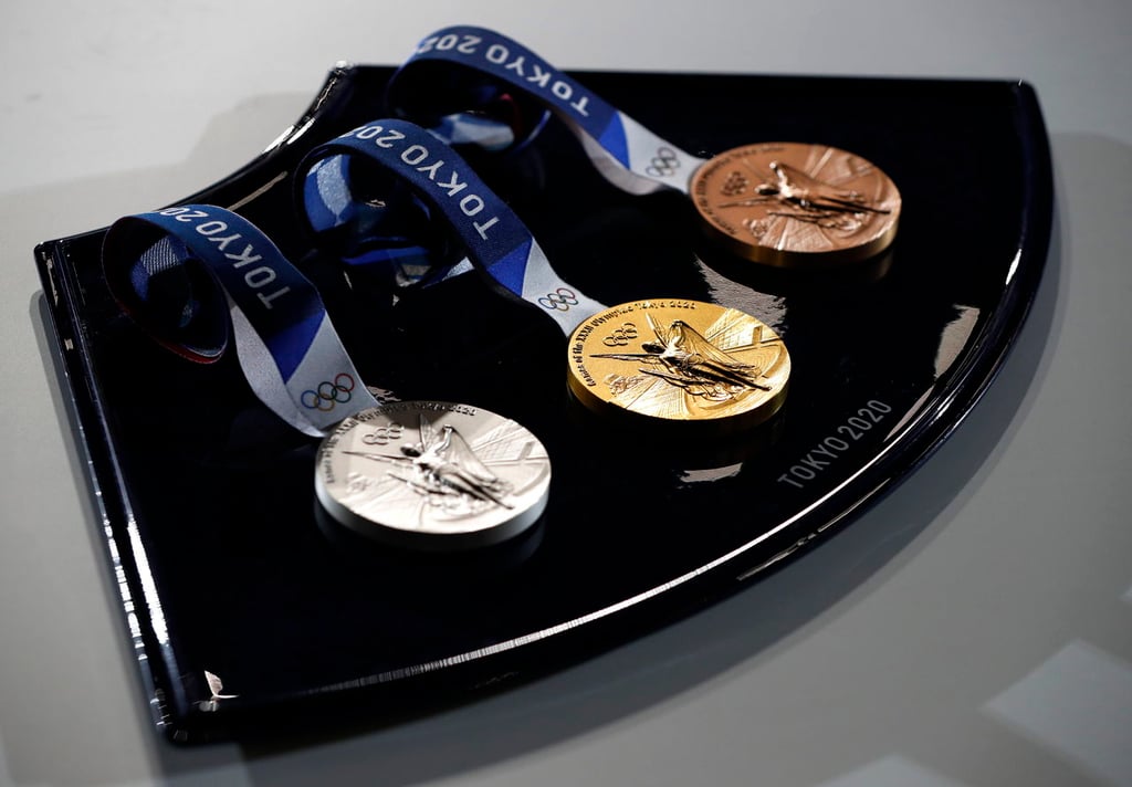 Medallistas se pondrán su propia presea en Tokio