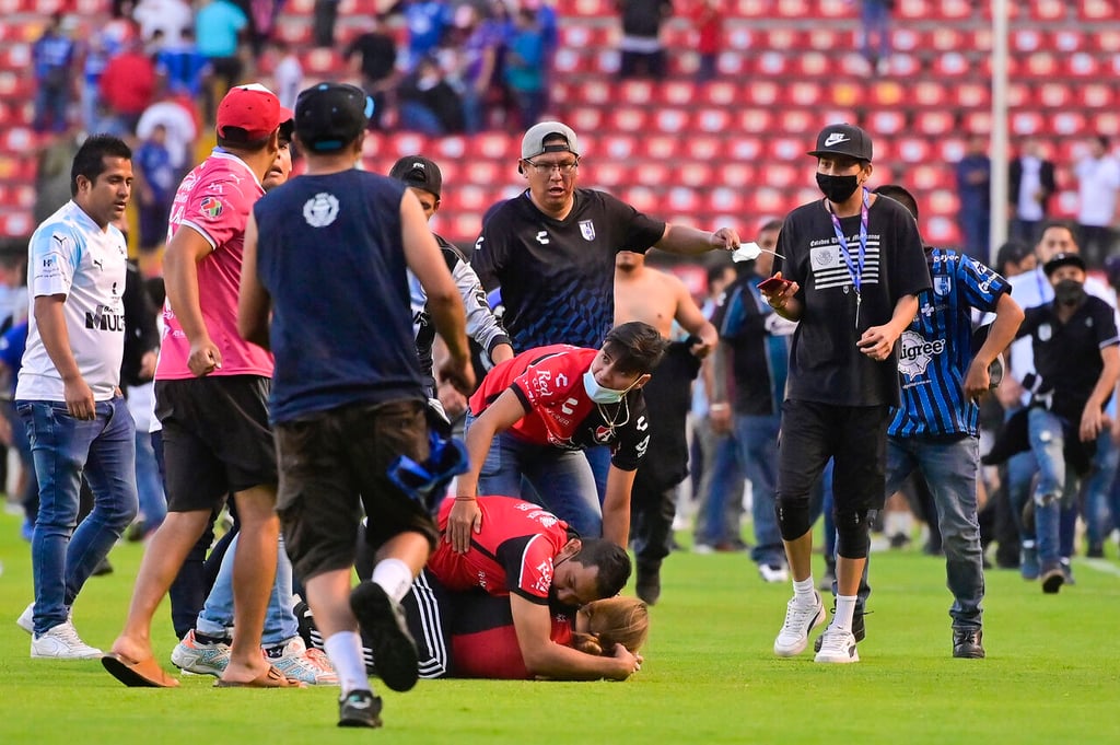 Procesan a otro aficionado del Atlas por violencia en el estadio Corregidora