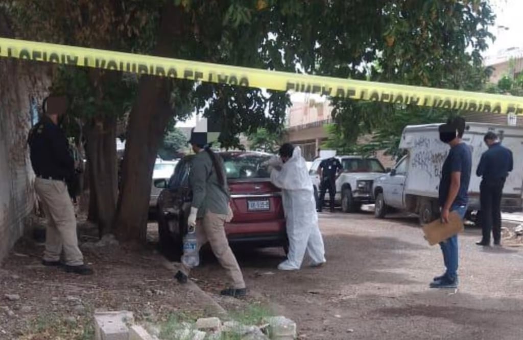 Mujer hallada sin vida en un coche, víctima de feminicidio