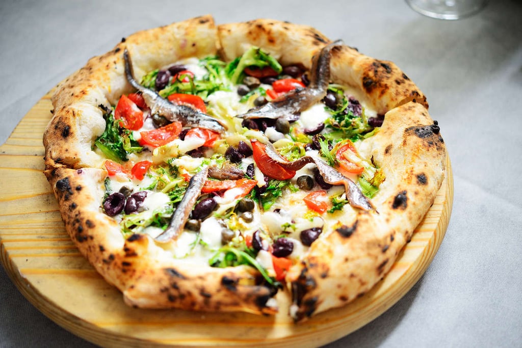 Secreto. Para su autor italiano, el ingrediente clave de toda buena pizza es la salsa de tomate, seguido de una correcta selección de vegetales.