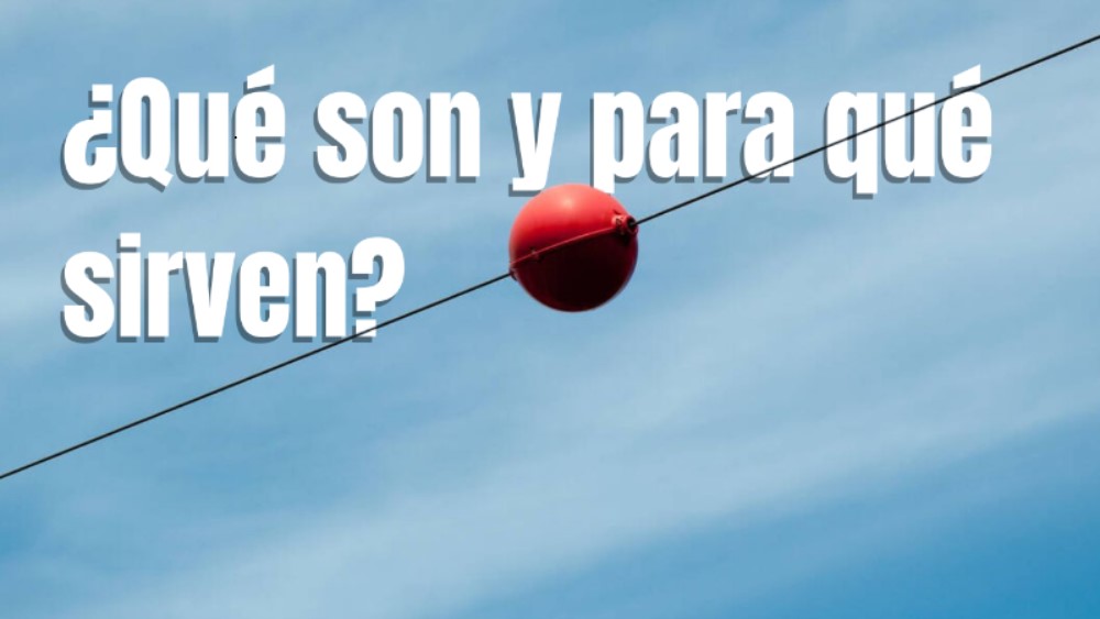¿Cuál es la función de las bolas rojas en los cables de luz de alta tensión?