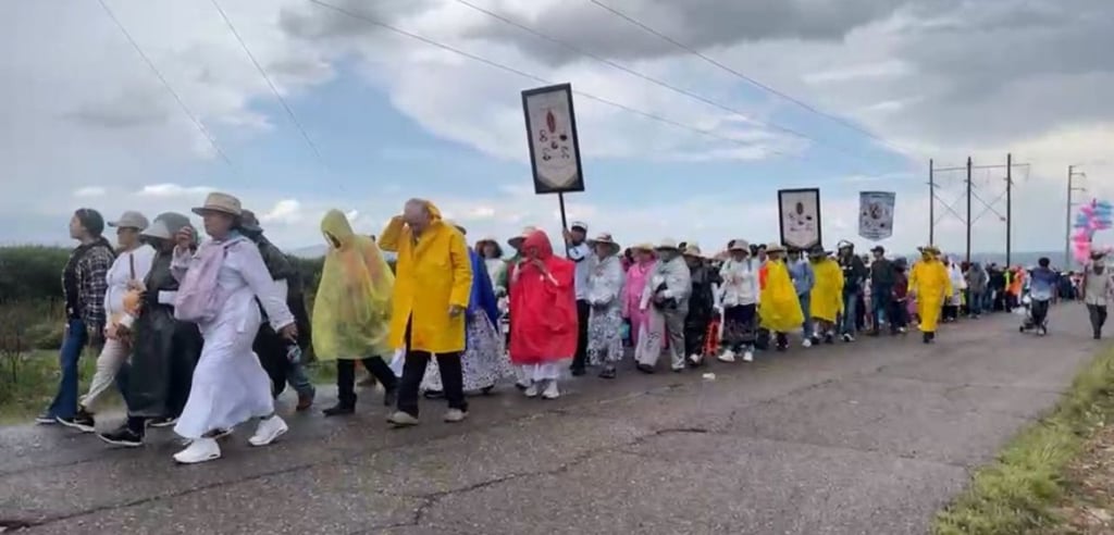 Lluvia. El último tramo lo recorrieron bajo una intensa lluvia.