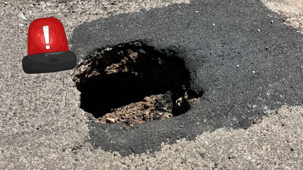 Automóvil cae en socavón de calle Negrete; ya había sido reportado