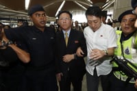 Two Malaysians leave North Korea, talks on to lift travel ban