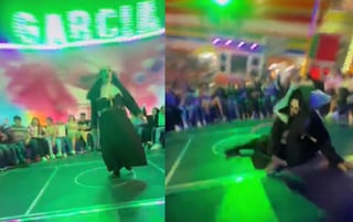 VIRAL: La 'Monja' de la feria se cae en juego mecánico 