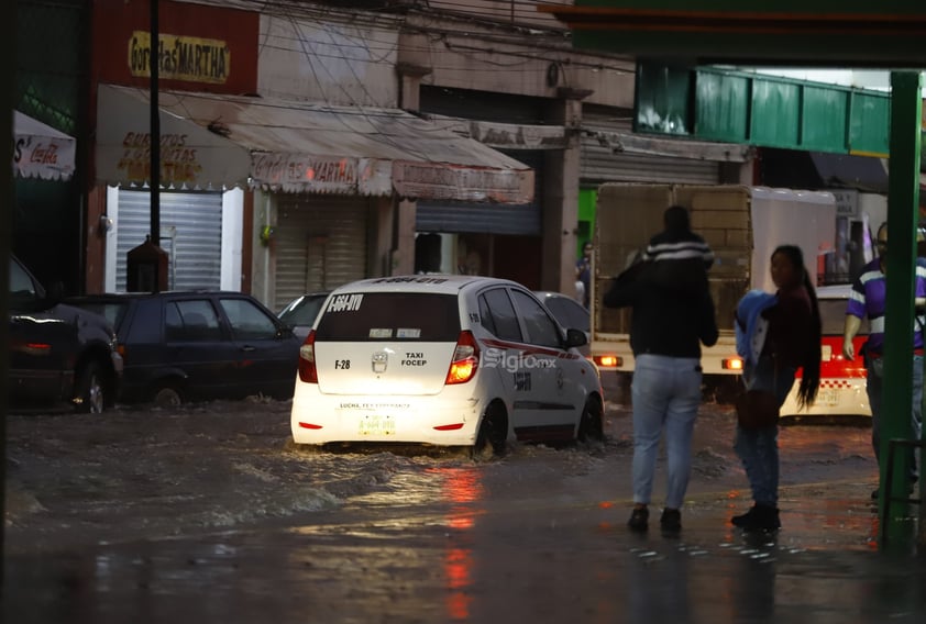 Una fuerte precipitación sorprendió a la ciudad capital