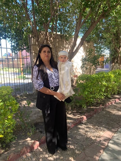 Nicolás tras pasar por la pila bautismal.