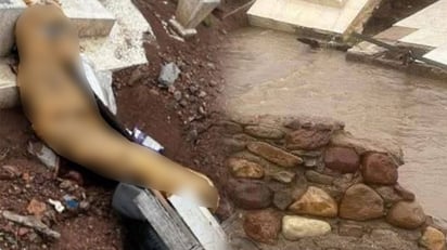 La fuerza de las lluvias dejó varios cuerpos humanos al descubierto. Estos salieron de sus tumbas debido a la magnitud de los chubascos.