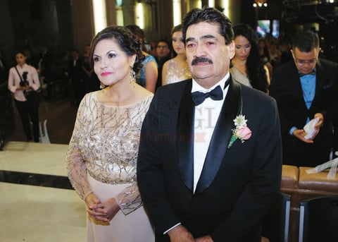 Los papás del novio.