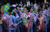 Los atletas de Japón llevaban una bandera de su país en una mano y en la otra una de Brasil.