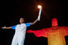 La medallista Rafaela Silva, y Tomas Magalhaes recibieron las antorchas.